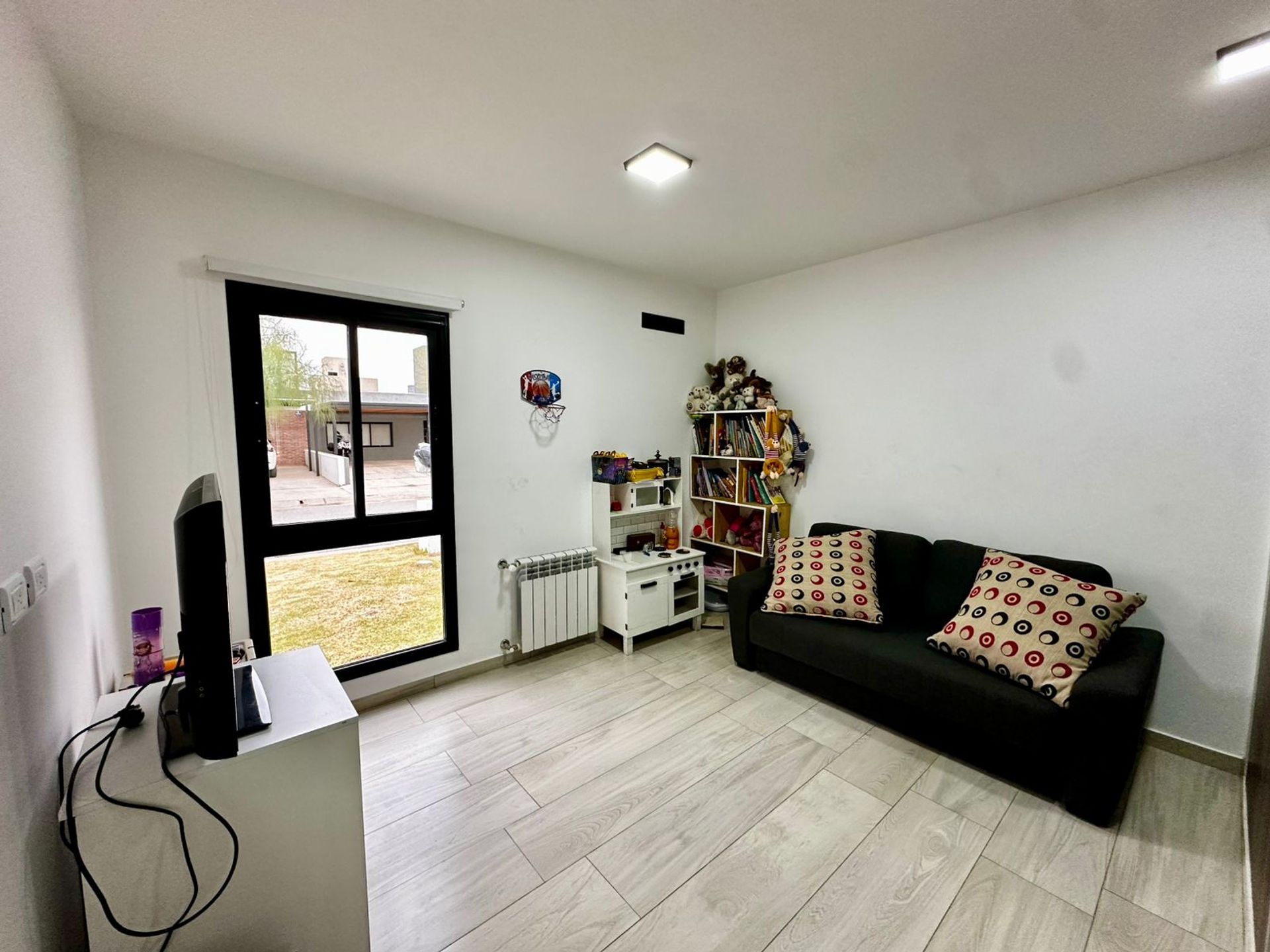 Fotografía de Espacios Sociales correspondiente a Casa_duplex en Docta Urbanización, Córdoba Capital.