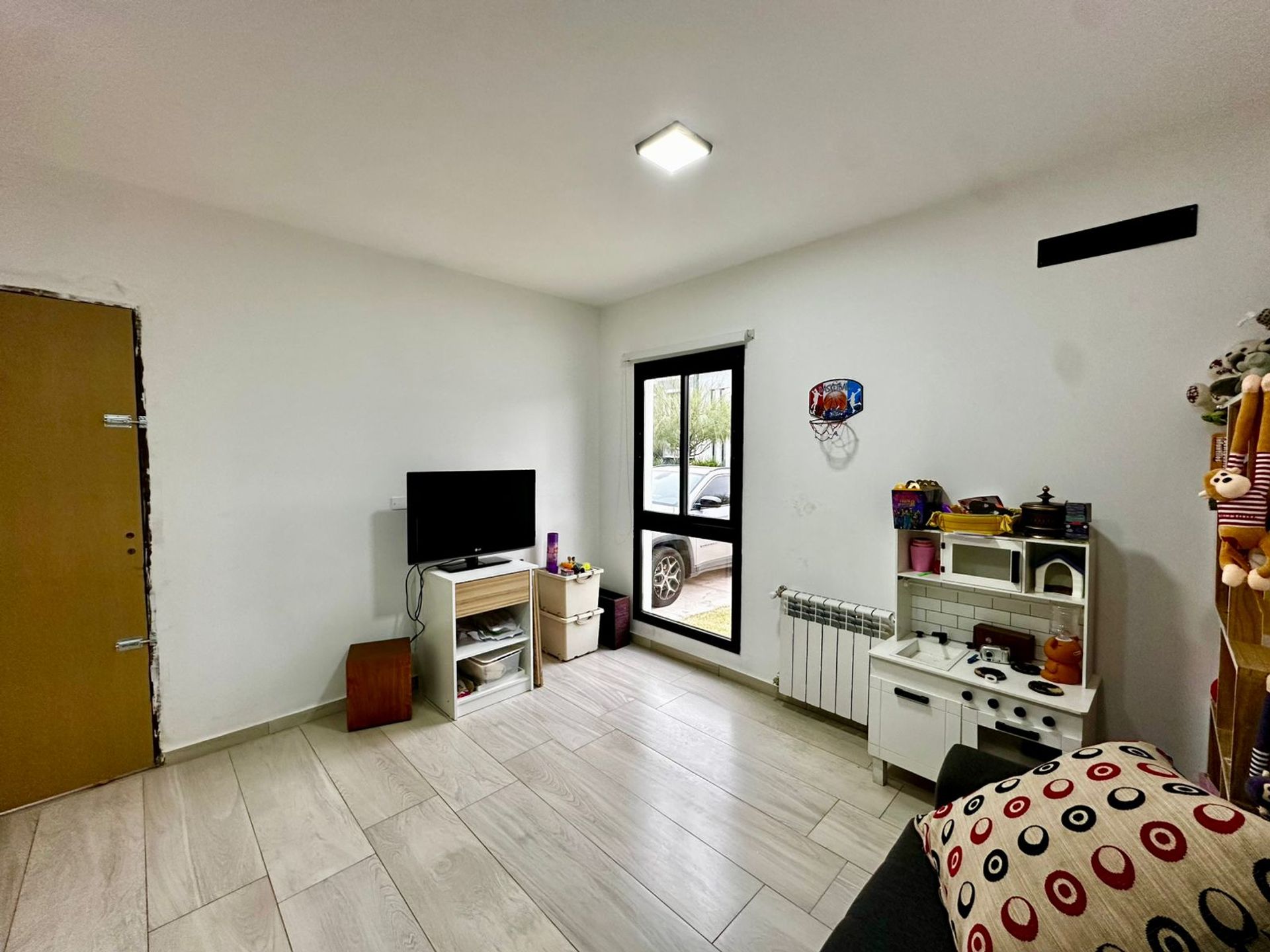 Fotografía de Espacios Sociales correspondiente a Casa_duplex en Docta Urbanización, Córdoba Capital.