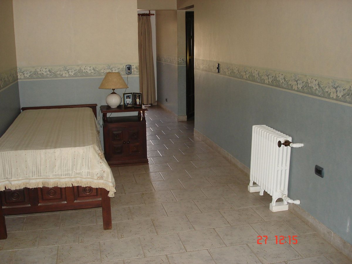 Fotografía de Habitaciones y Baños correspondiente a Casa en Barrio Punilla, La Falda.