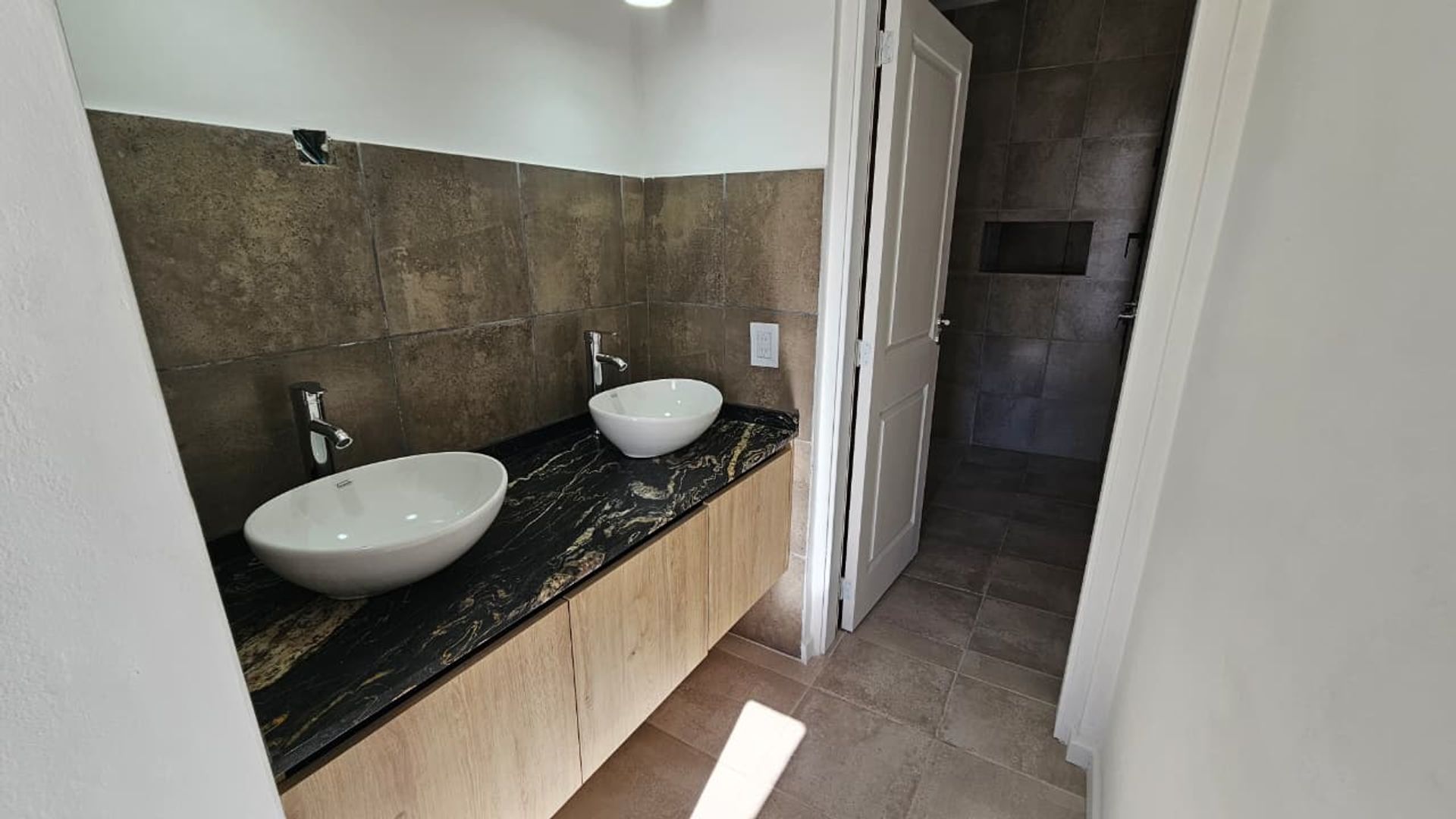 Fotografía de Habitaciones y Baños correspondiente a Casa en Barrio Villa Carlos Paz, Villa Carlos Paz.