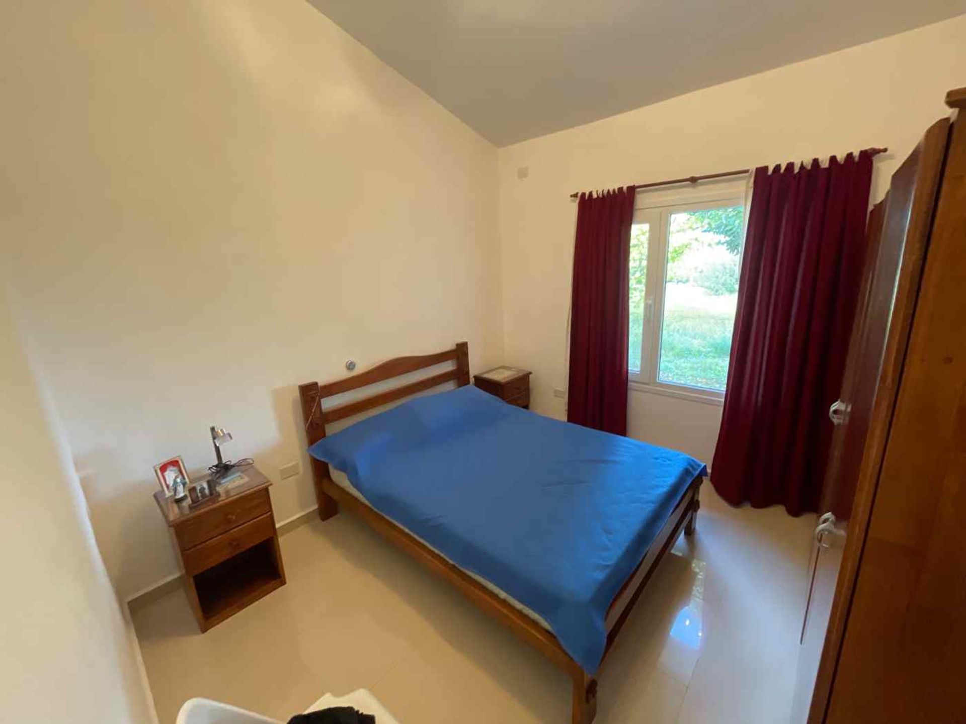 Fotografía de Habitaciones y Baños correspondiente a Casa en Barrio Villa Giardino, Villa Giardino.