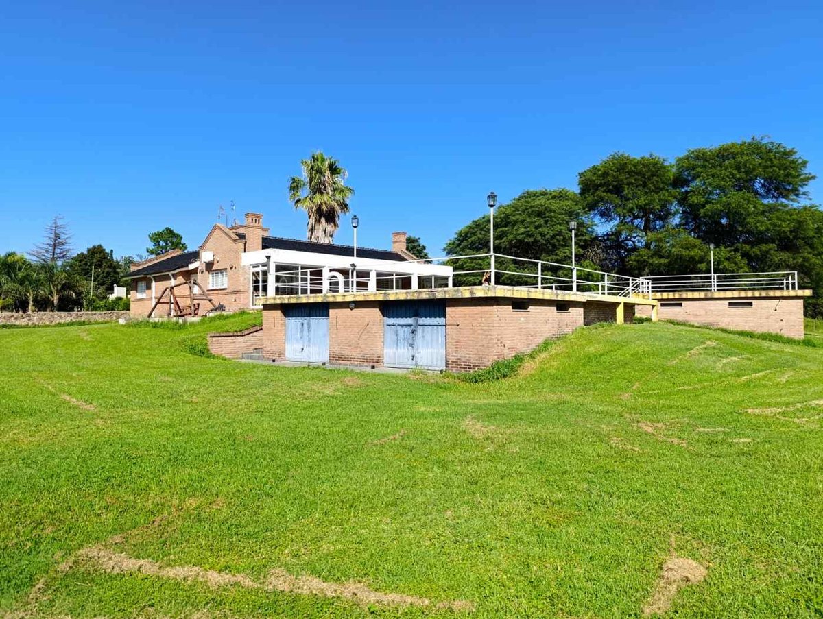 Fotografía de Patios y Exteriores correspondiente a Casa en Barrio Villa Carlos Paz, Villa Lago Azul.