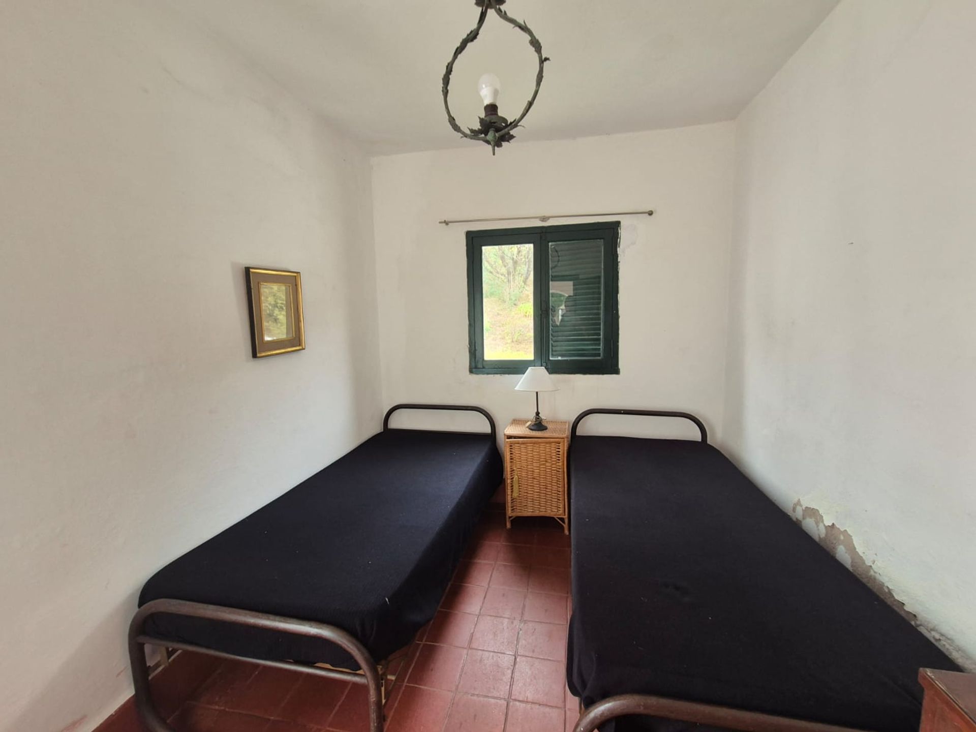Fotografía de Habitaciones y Baños correspondiente a Casa en Barrio Colon, La Granja.