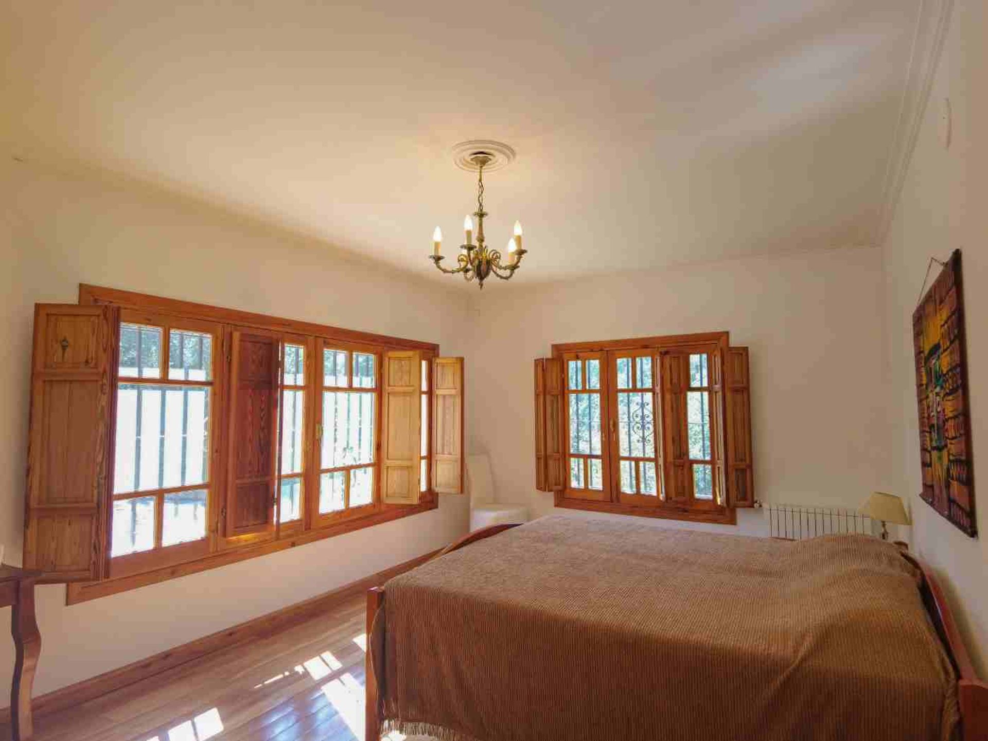 Fotografía de Habitaciones y Baños correspondiente a Casa en Barrio Calamuchita, Villa General Belgrano.