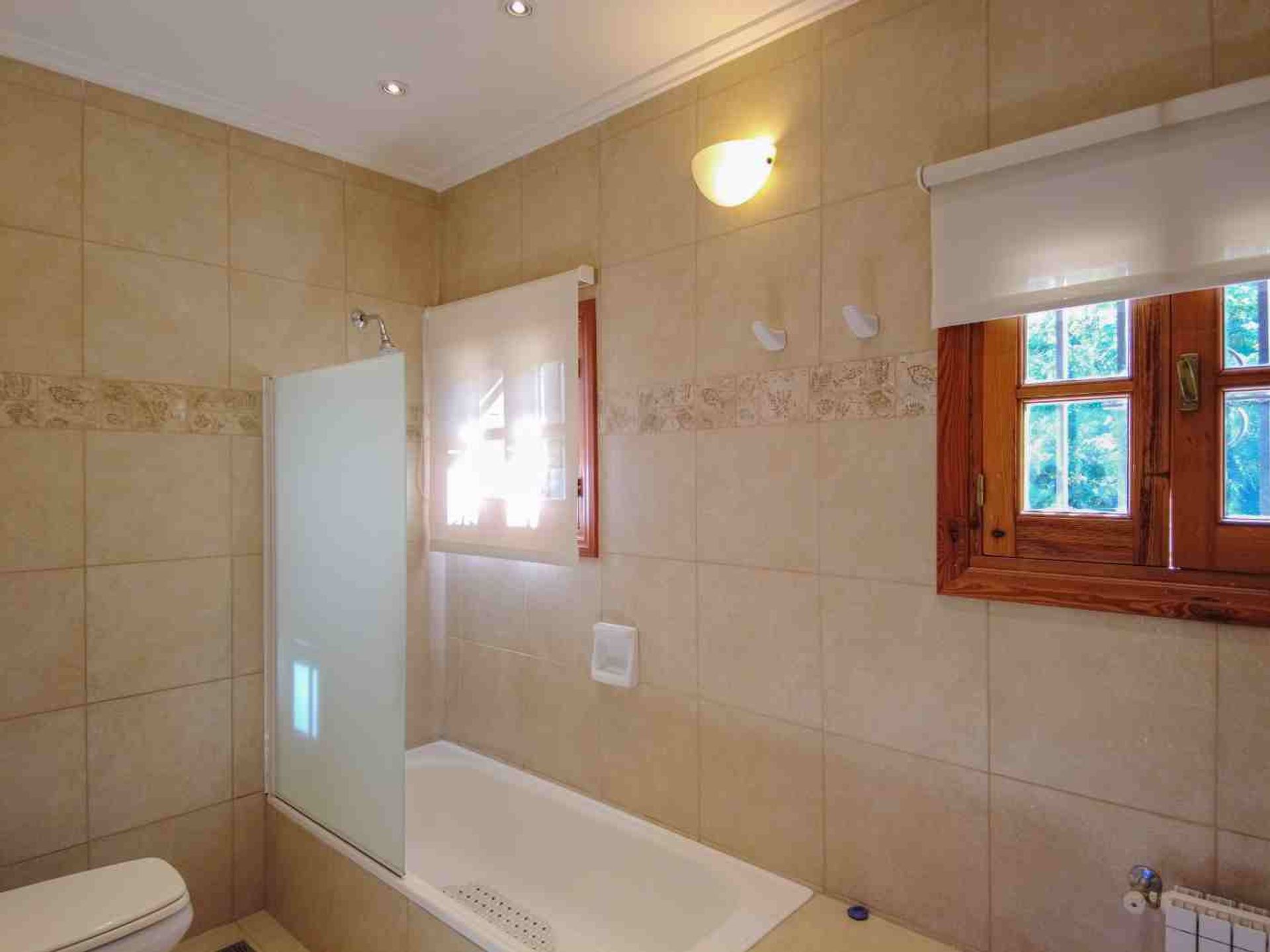 Fotografía de Habitaciones y Baños correspondiente a Casa en Barrio Calamuchita, Villa General Belgrano.