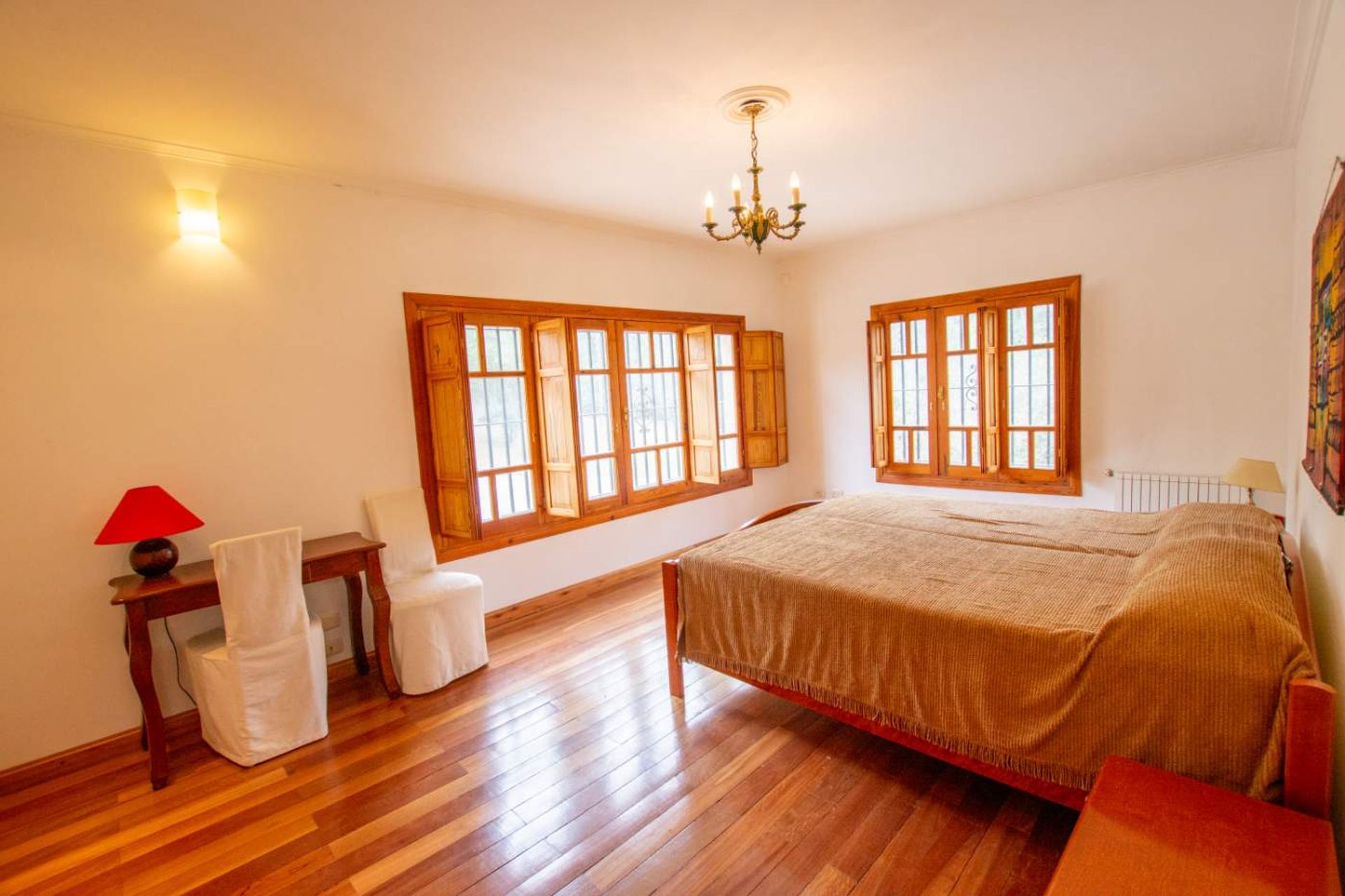 Fotografía de Habitaciones y Baños correspondiente a Casa en Barrio Calamuchita, Villa General Belgrano.