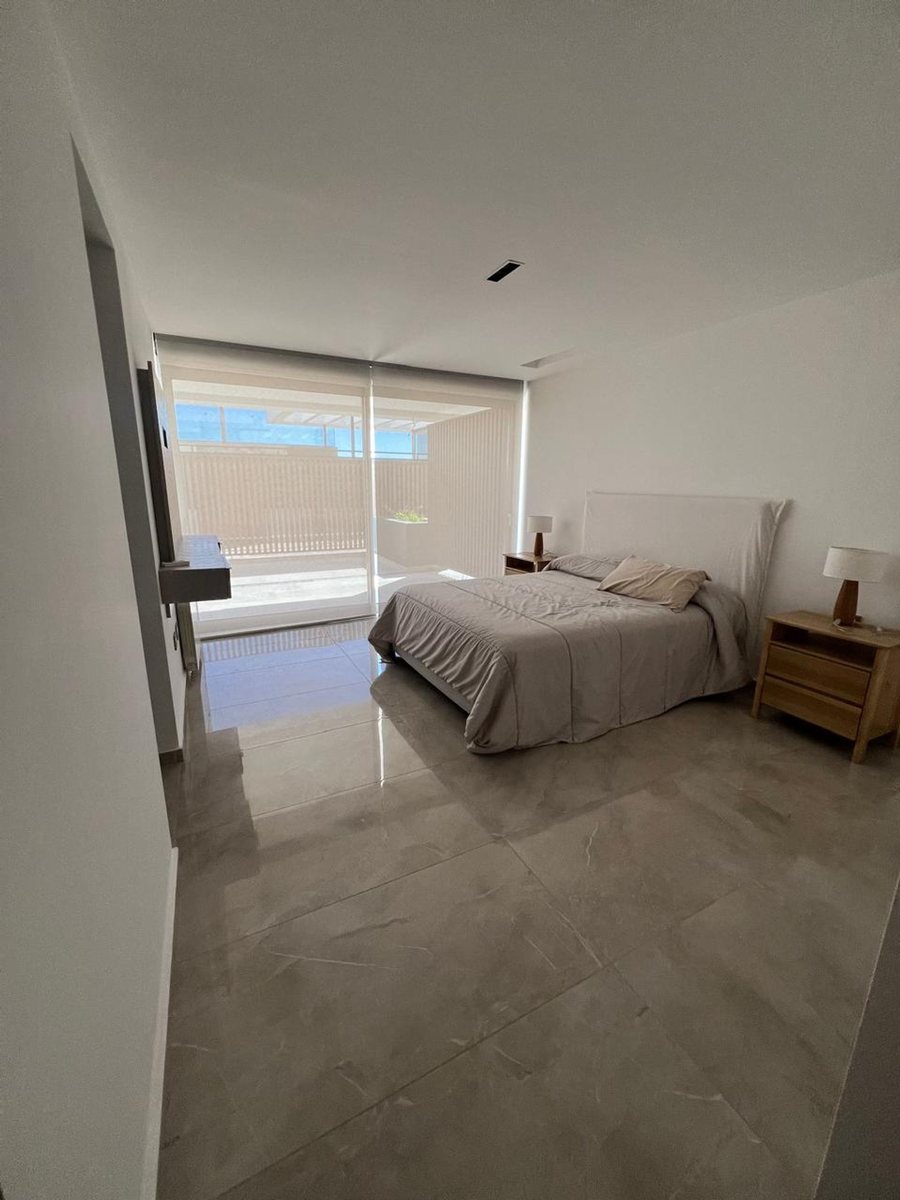 Fotografía de Habitaciones y Baños correspondiente a Casa_duplex en Barrio Villa Carlos Paz, Costa Azul Norte.