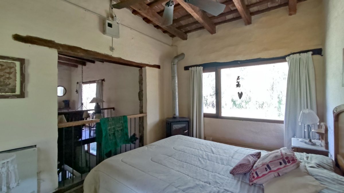 Fotografía de Habitaciones y Baños correspondiente a Quinta en Barrio San Javier, La Poblacion.