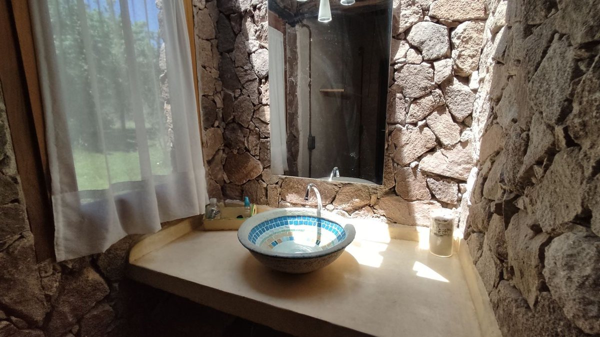 Fotografía de Habitaciones y Baños correspondiente a Quinta en Barrio San Javier, La Poblacion.