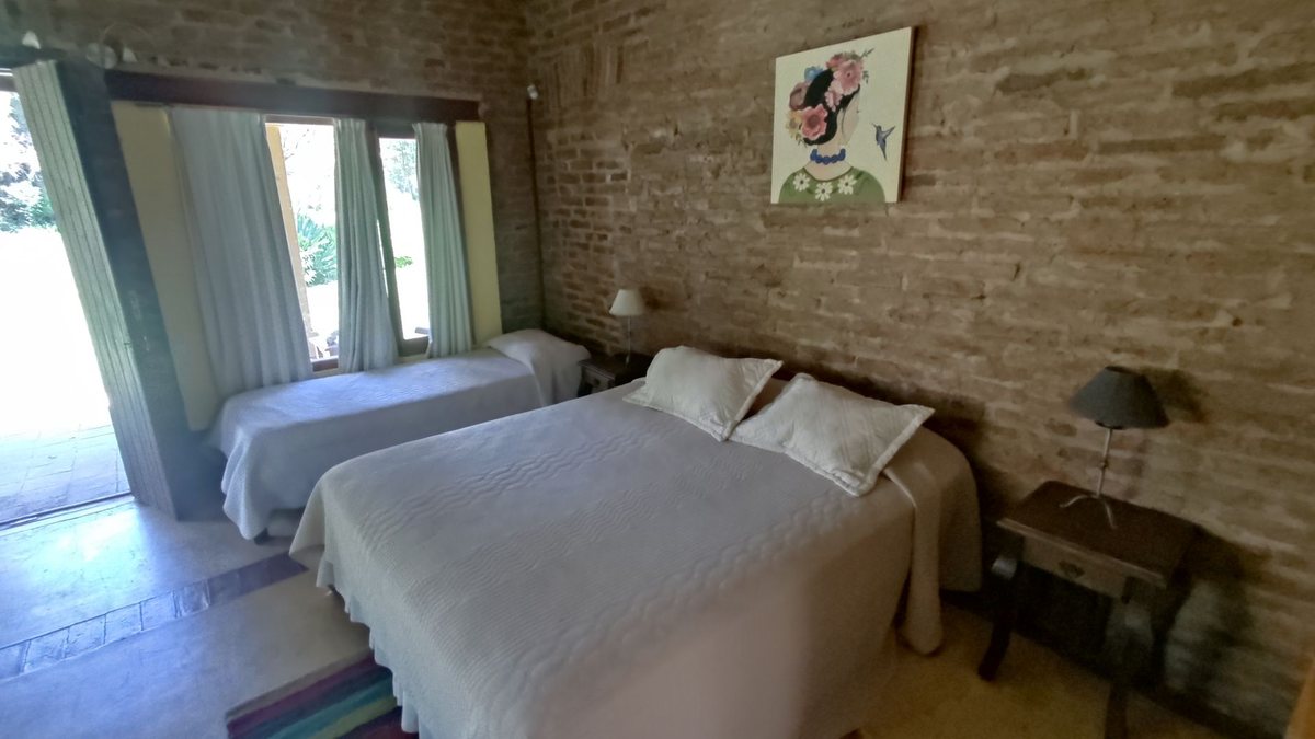 Fotografía de Habitaciones y Baños correspondiente a Quinta en Barrio San Javier, La Poblacion.