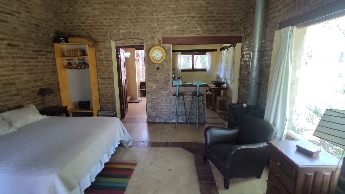 Fotografía de Habitaciones y Baños correspondiente a Quinta en Barrio San Javier, La Poblacion.