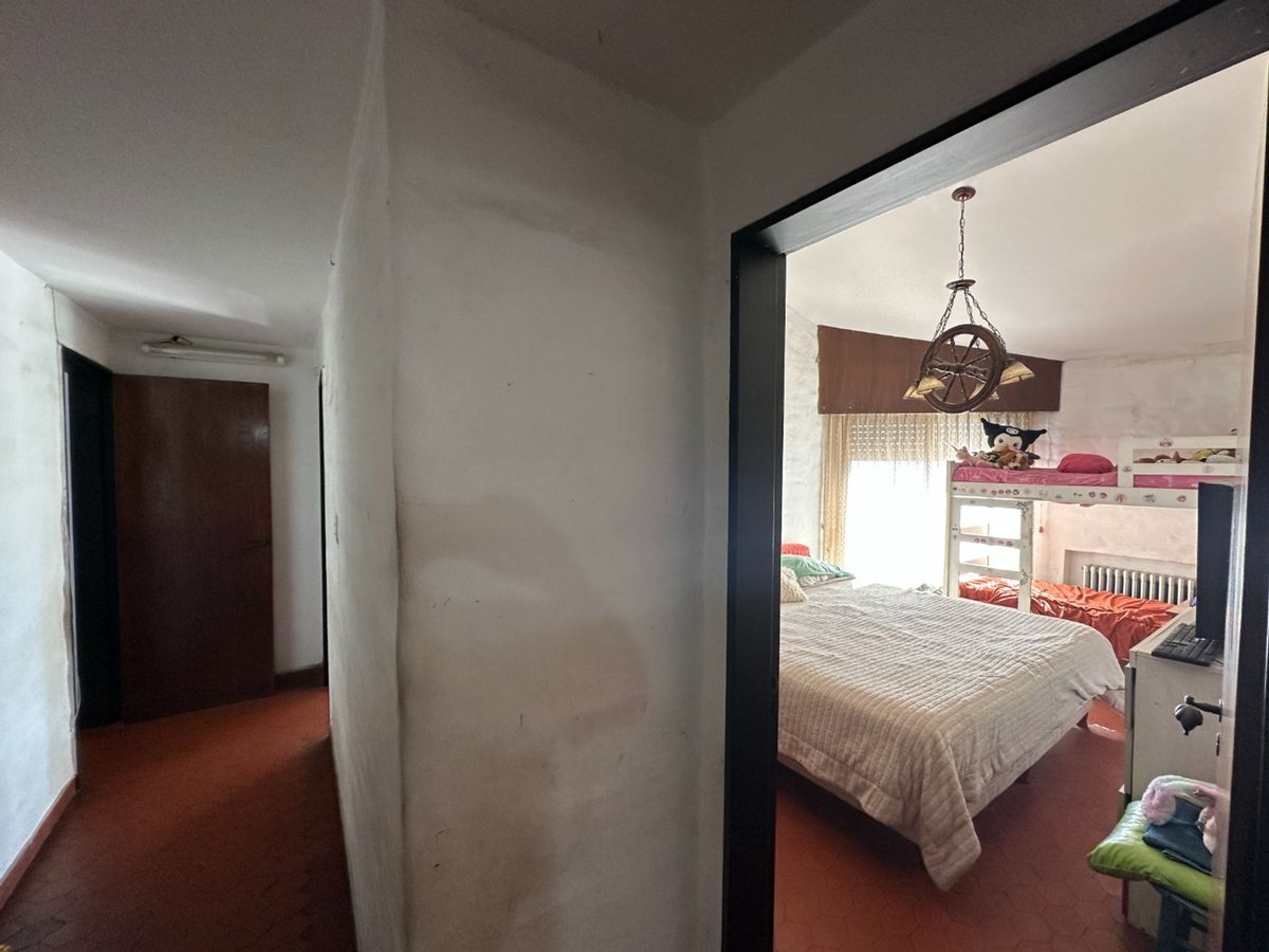 Fotografía de Habitaciones y Baños correspondiente a Terrenos_y_lotes en Barrio Villa Carlos Paz, Villa Carlos Paz.